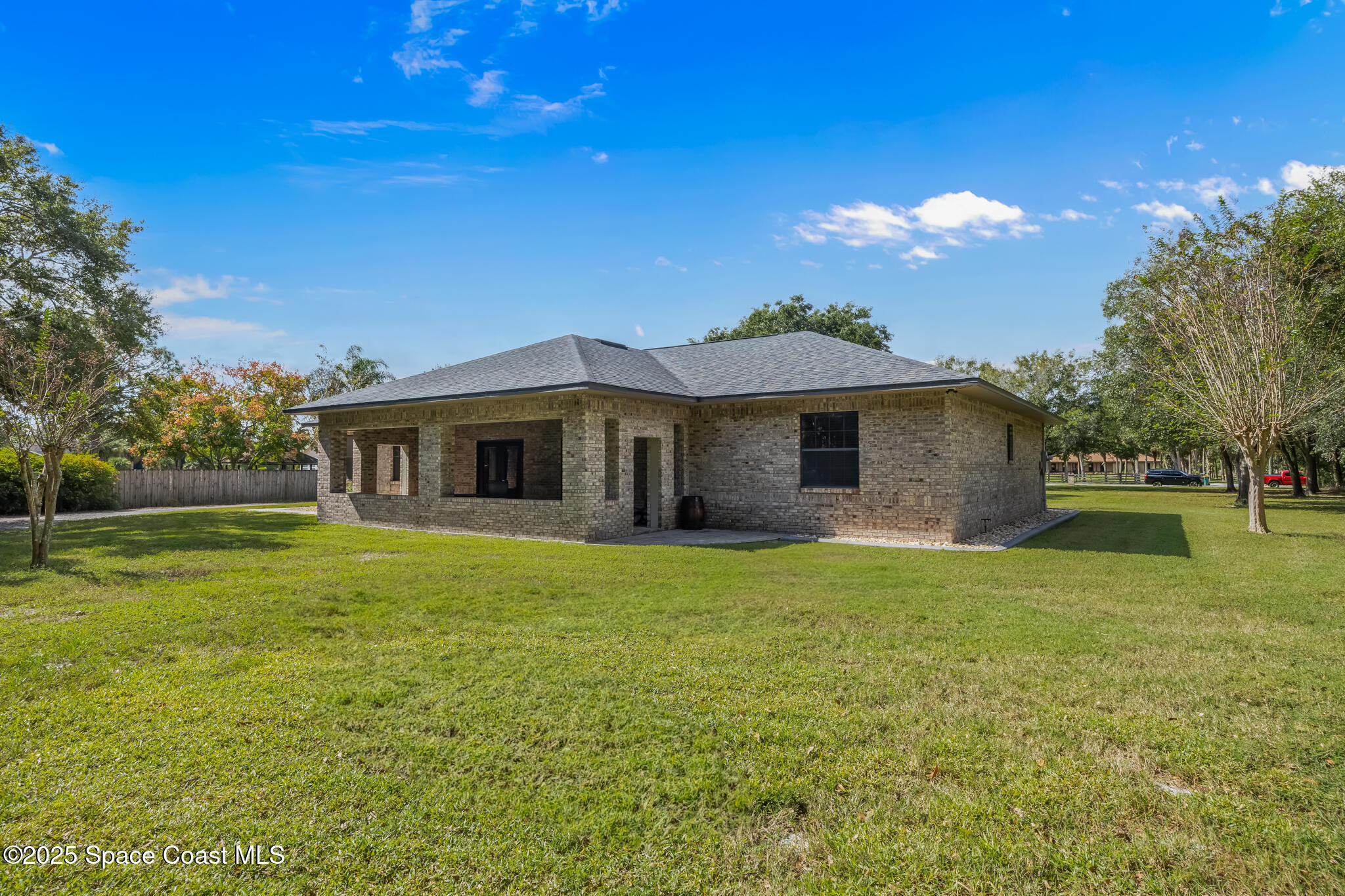 5495 Pine Street Cocoa, FL 32927 - Photo 35 of 45 a front view of a house with a yard