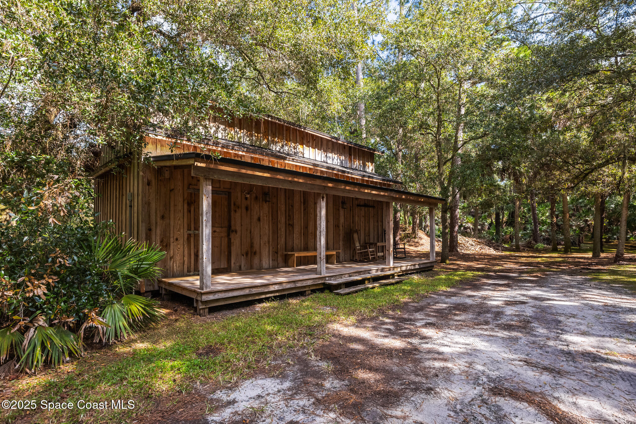 5495 Pine Street Cocoa, FL 32927 - Photo 36 of 45 a front view of a house with garden