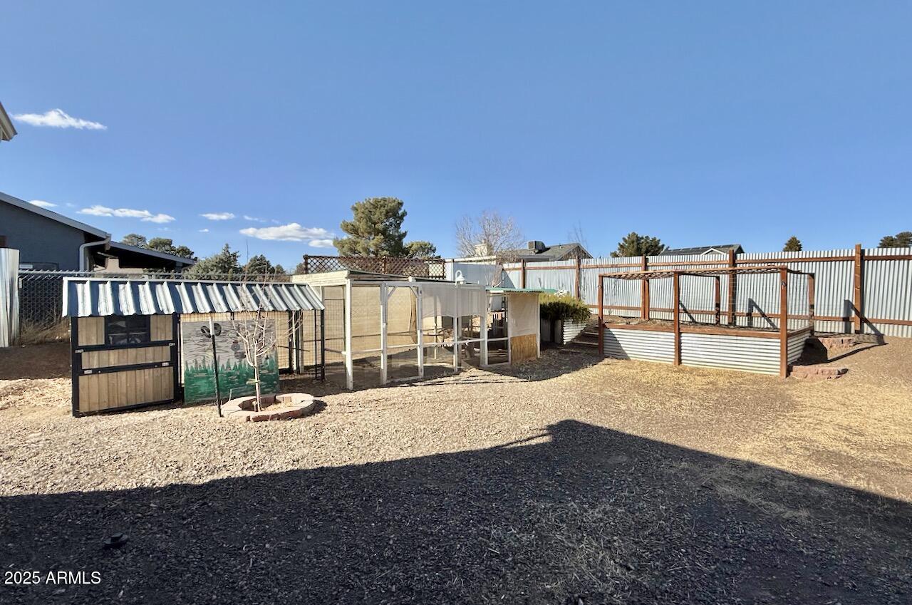 17642 East Trails End Road Mayer, AZ 86333 - Photo 34 of 43 34 Backyard Garden-Chicken Coop