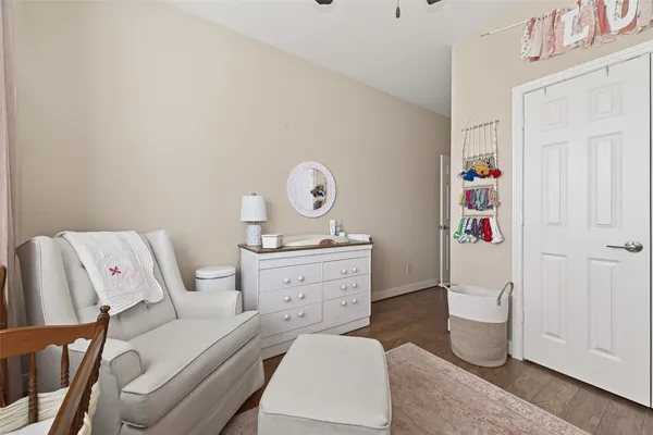 a room with a bed and furniture