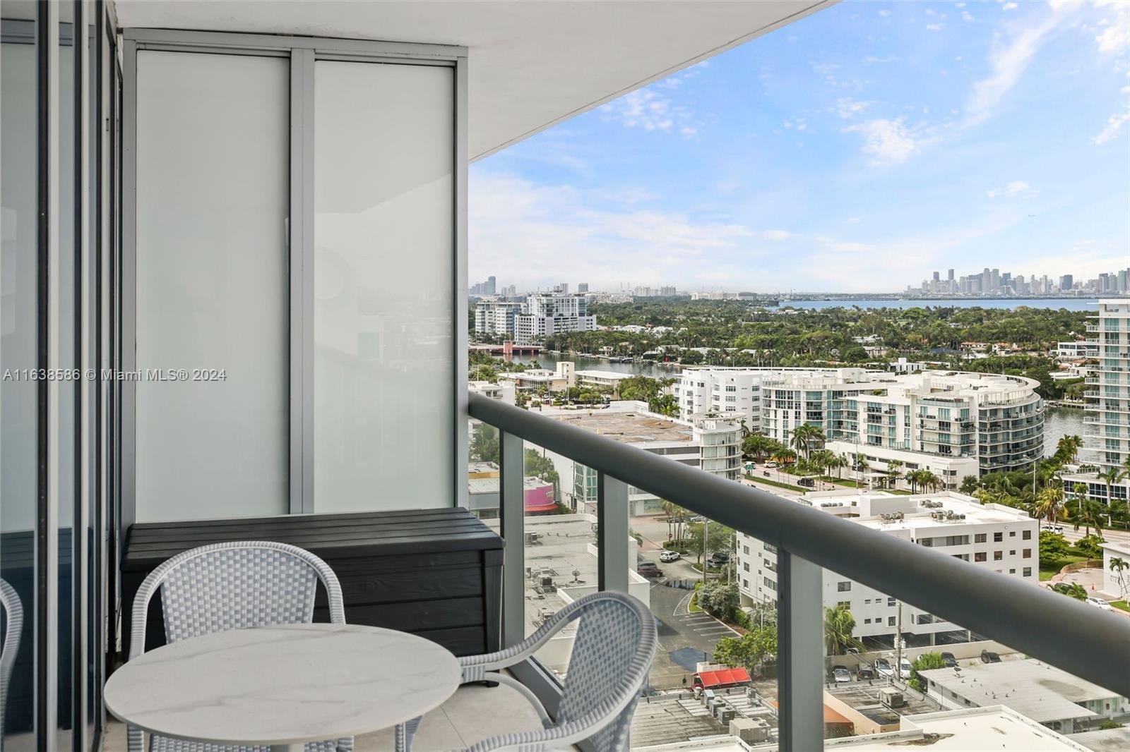 6799 Collins Avenue, Unit 1601 Miami Beach, FL 33141 - Photo 14 of 64 a view of balcony with furniture