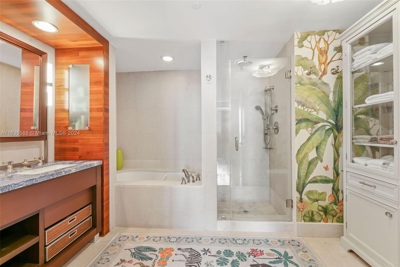 6799 Collins Avenue, Unit 1601 Miami Beach, FL 33141 - Photo 21 of 64 a bathroom with a bathtub and a shower