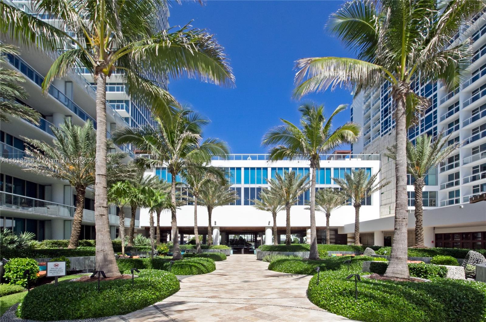 6799 Collins Avenue, Unit 1601 Miami Beach, FL 33141 - Photo 30 of 64 a view of multiple houses with a yard