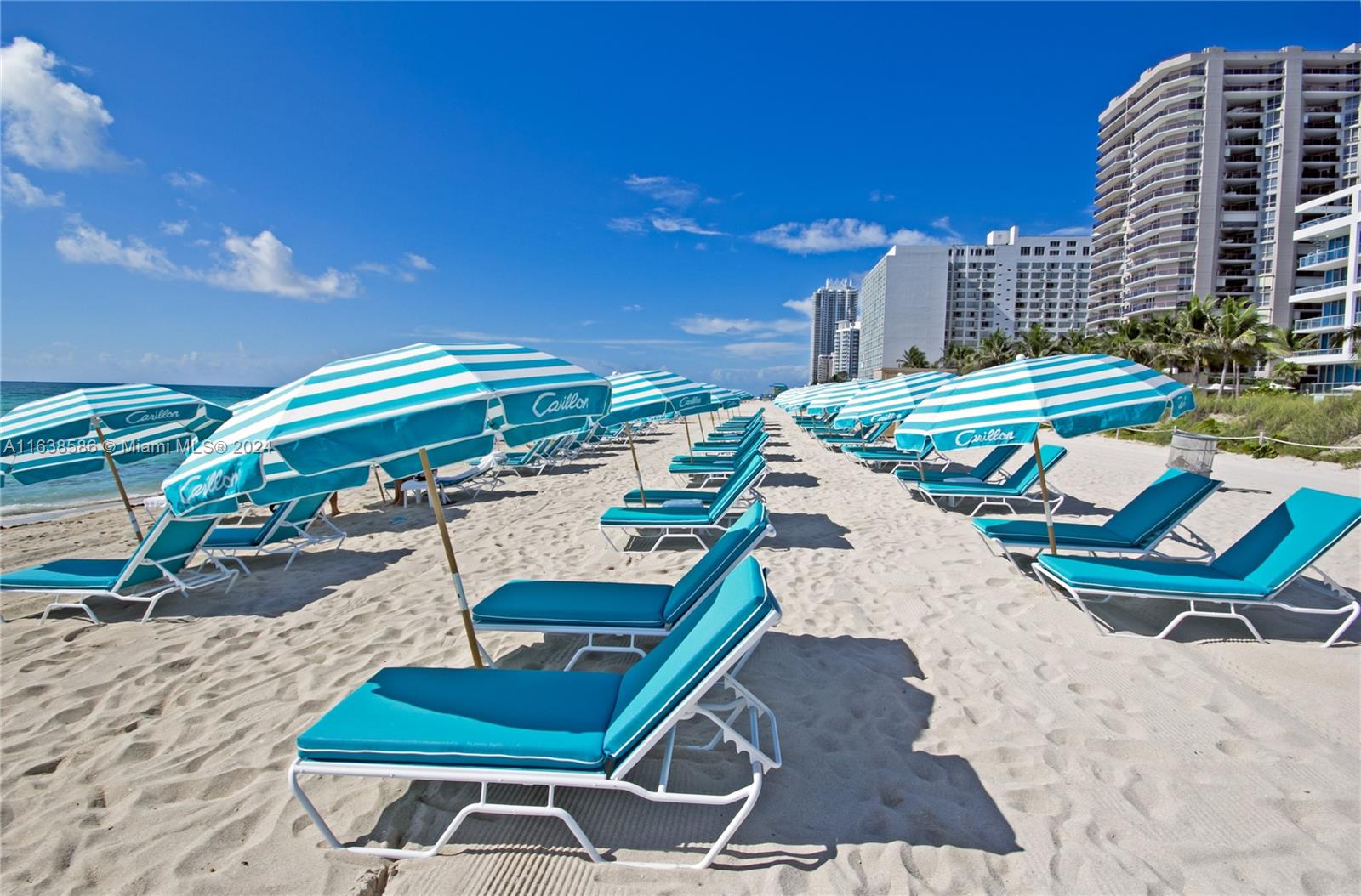 6799 Collins Avenue, Unit 1601 Miami Beach, FL 33141 - Photo 61 of 64 a view of a chairs and table in the patio