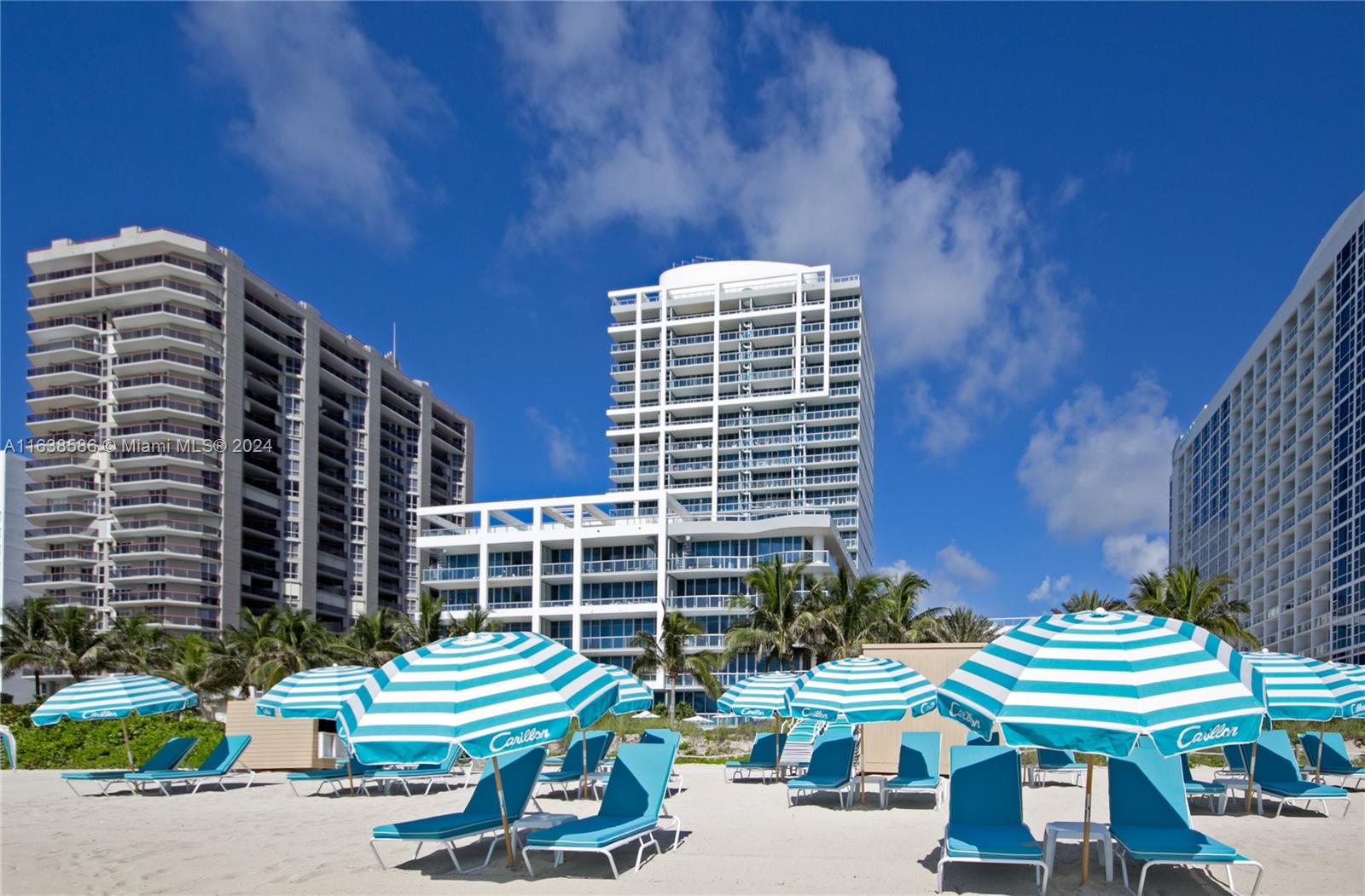 6799 Collins Avenue, Unit 1601 Miami Beach, FL 33141 - Photo 62 of 64 a front view of a building with outdoor seating