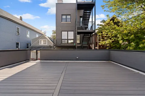 a view of a house with roof deck