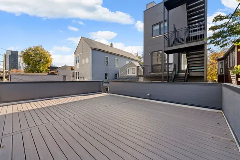 a view of a house with a roof deck
