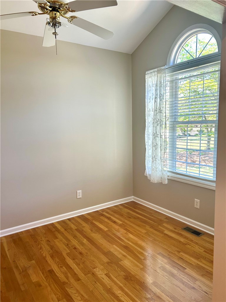 116 Buttercup Trail Anderson, SC 29621 - Photo 17 of 49 This airy room features rich hardwood flooring and a vaulted ceiling.