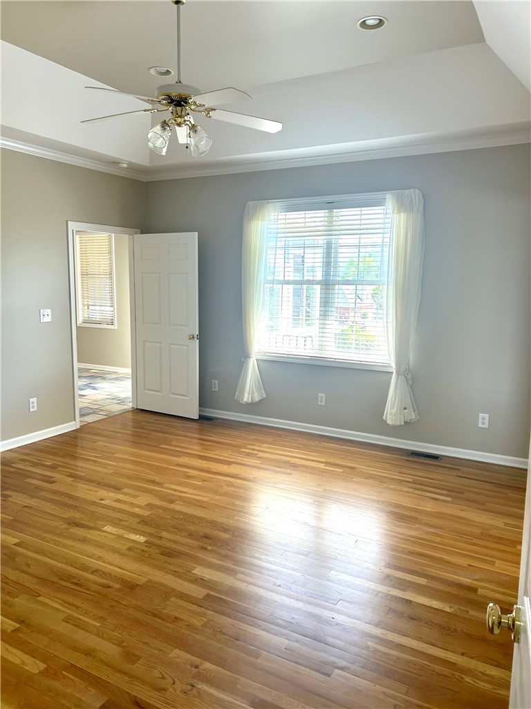 116 Buttercup Trail Anderson, SC 29621 - Photo 18 of 49 Bright and airy room featuring warm hardwood flooring and ample natural light.