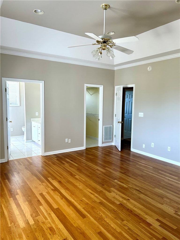116 Buttercup Trail Anderson, SC 29621 - Photo 19 of 49 This spacious bedroom offers gleaming hardwood floors and ample natural light.