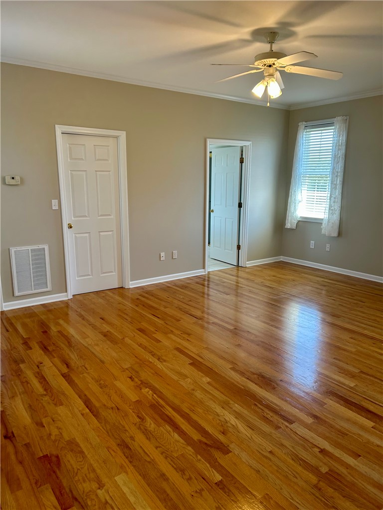 116 Buttercup Trail Anderson, SC 29621 - Photo 28 of 49 This airy room features rich hardwood flooring and abundant natural light, creating a welcoming atmosphere.
