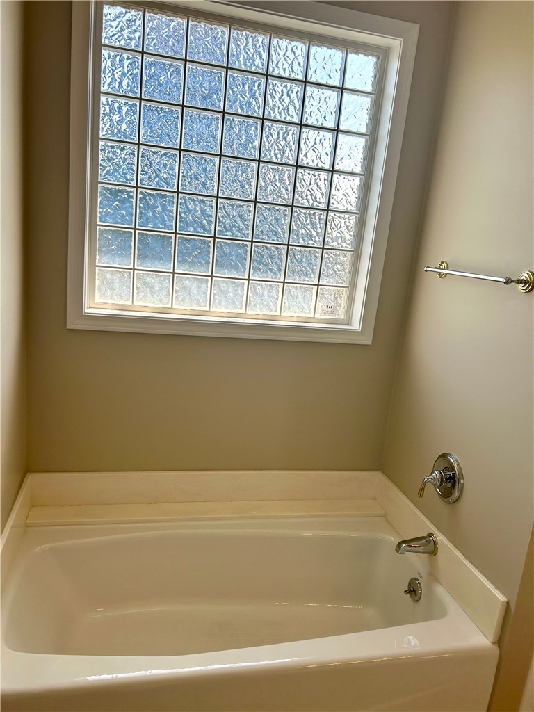 116 Buttercup Trail Anderson, SC 29621 - Photo 31 of 49 Relax in this inviting bathtub, complemented by a decorative glass block window.