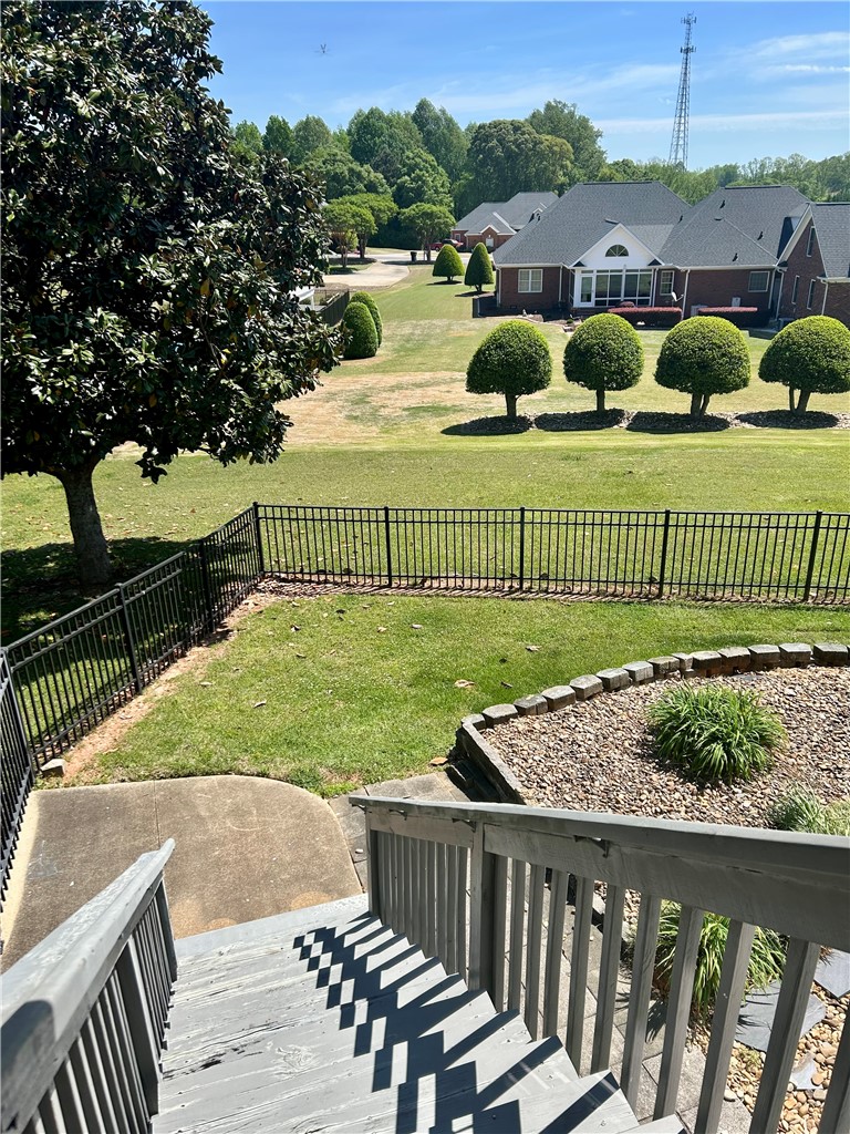 116 Buttercup Trail Anderson, SC 29621 - Photo 40 of 49 This spacious yard offers a serene retreat, perfect for relaxation and outdoor enjoyment.