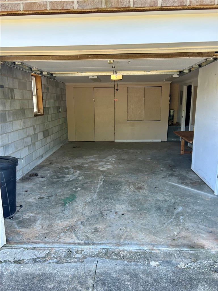 116 Buttercup Trail Anderson, SC 29621 - Photo 43 of 49 This spacious garage offers ample storage and direct access, perfect for convenience and organization.