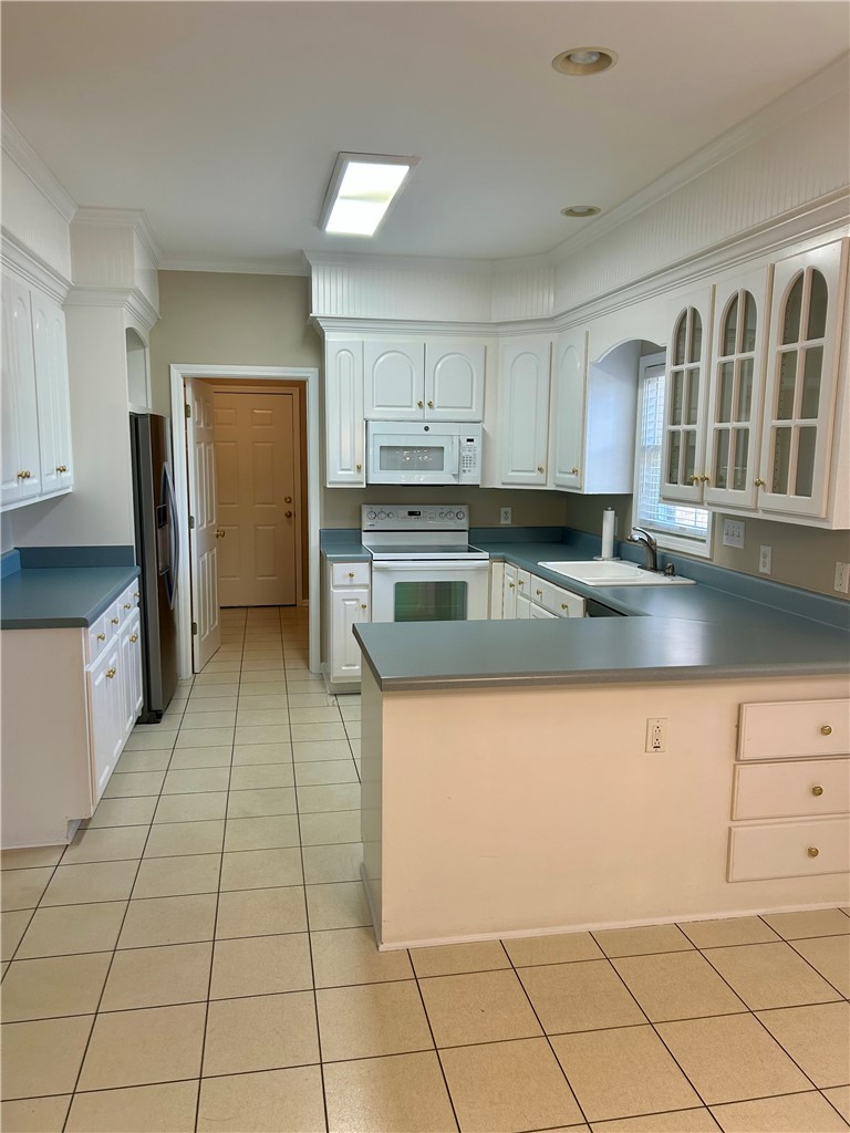 116 Buttercup Trail Anderson, SC 29621 - Photo 6 of 49 This spacious kitchen offers ample cabinetry and counter space, perfect for culinary endeavors.