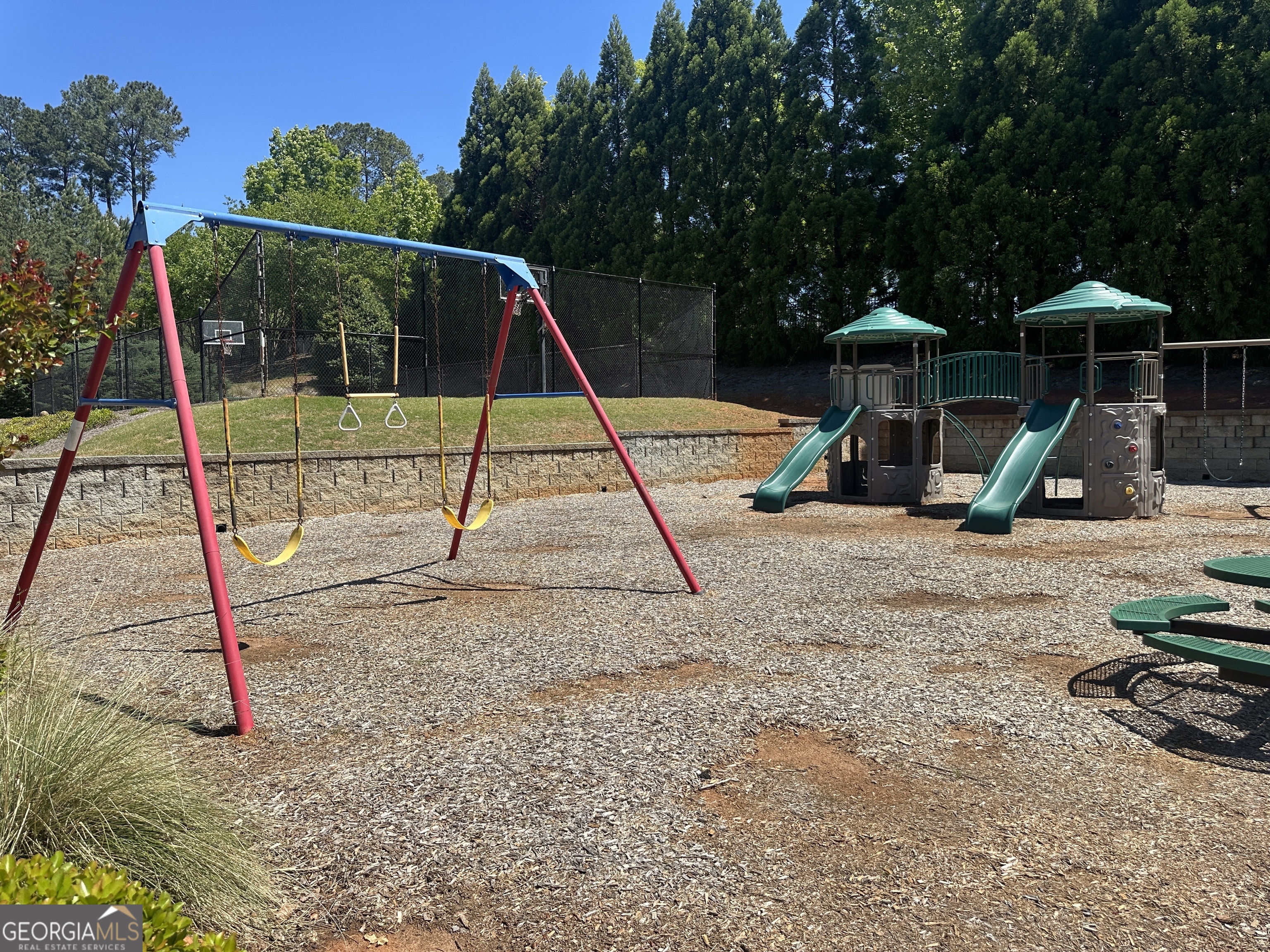 98 Adam Drive Forsyth, GA 31029 - Photo 4 of 9 a view of park with a slide