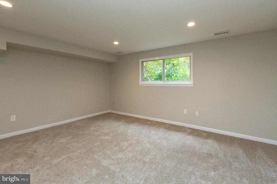 813 Lowander Lane Silver Spring, MD 20901 - Photo 18 of 25 Lower level family room