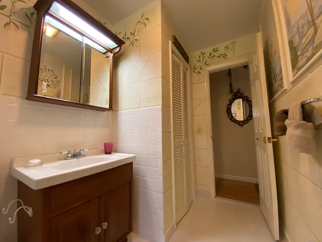 a view of living room with furniture and washing machine