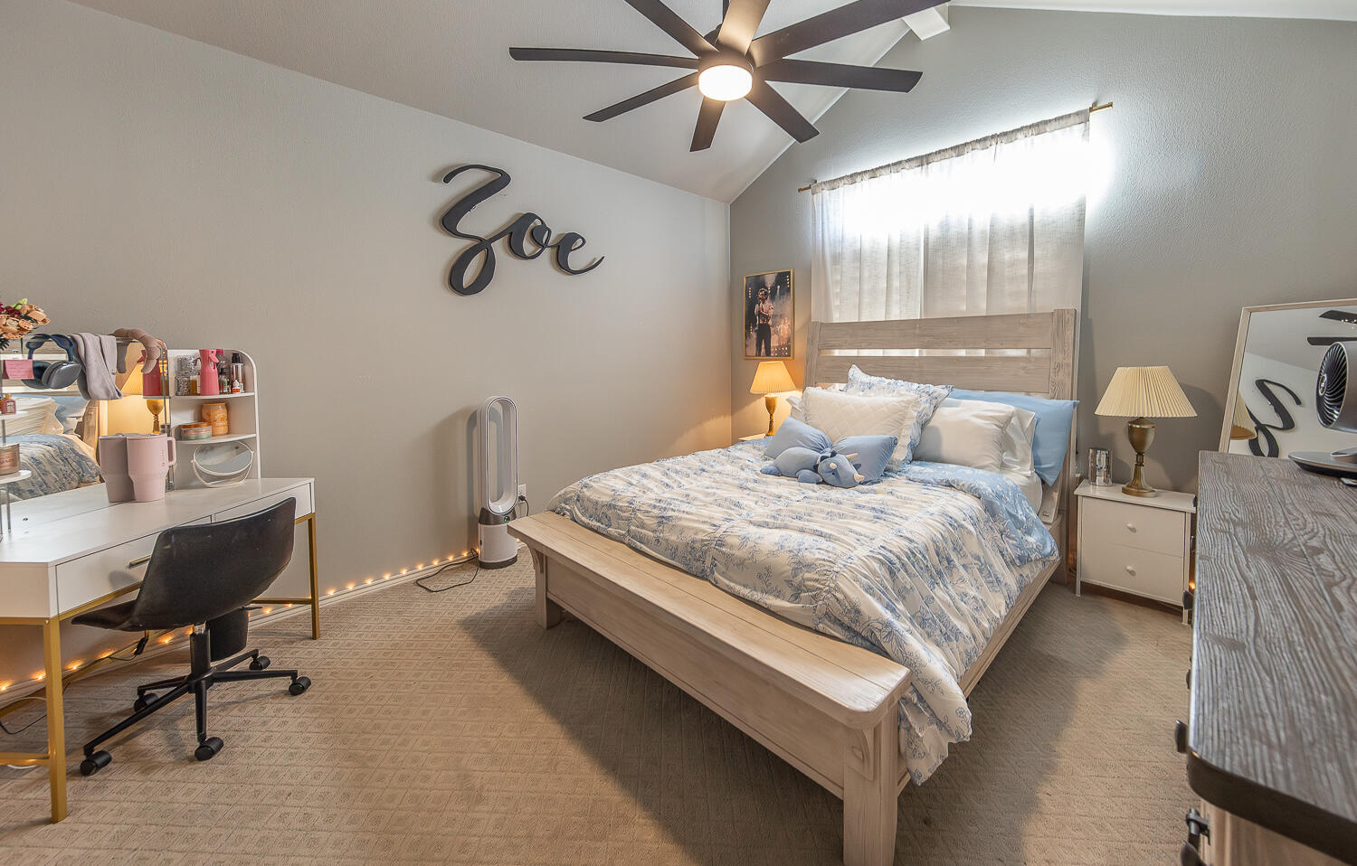 4416 140th Street Lubbock, TX 79424 - Photo 24 of 36 a bedroom with a bed and a desk