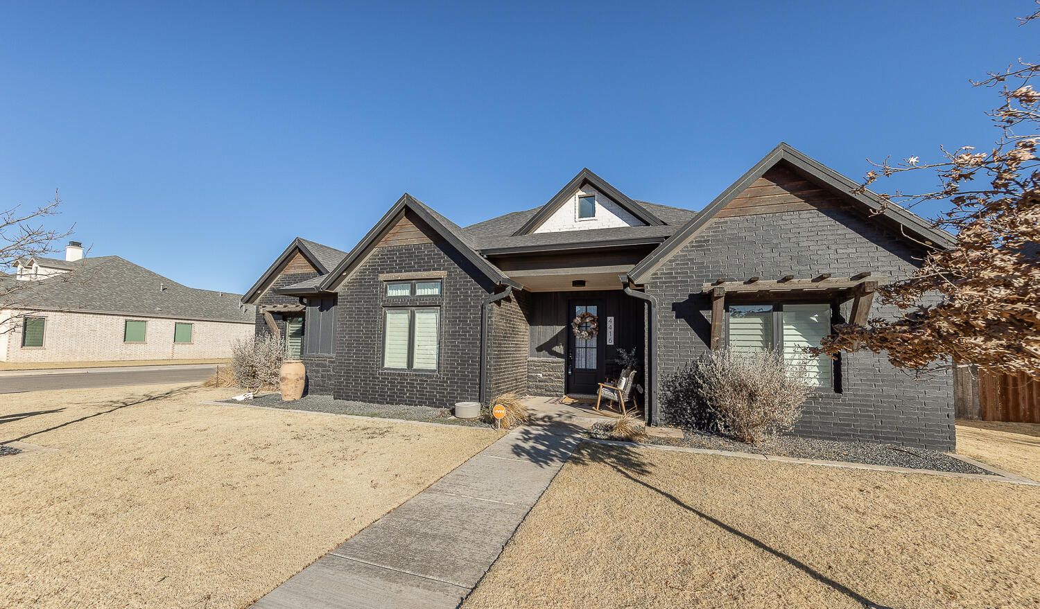 4416 140th Street Lubbock, TX 79424 - Photo 36 of 36 a front view of a house with garden