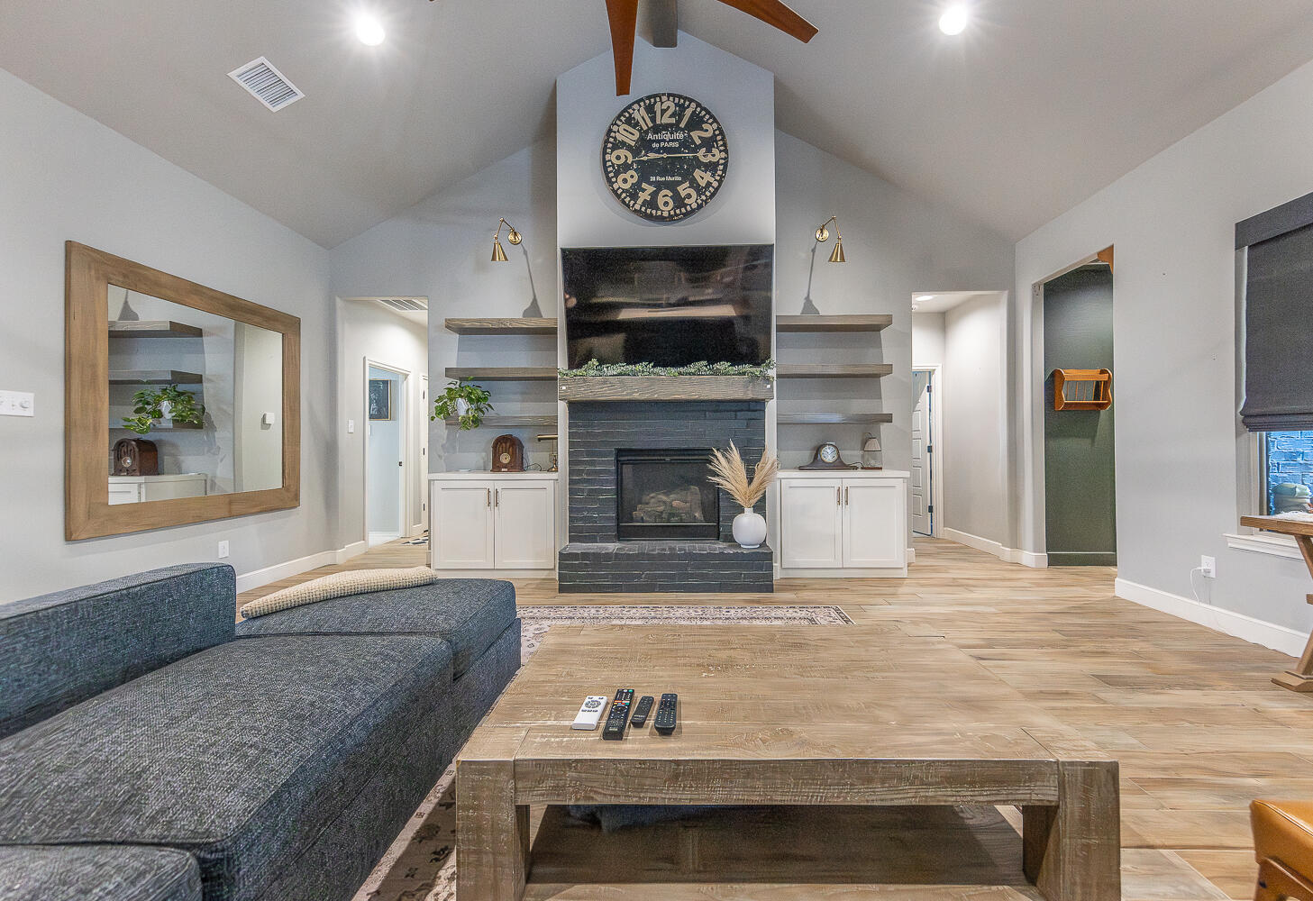 4416 140th Street Lubbock, TX 79424 - Photo 7 of 36 a living room with furniture and a fireplace