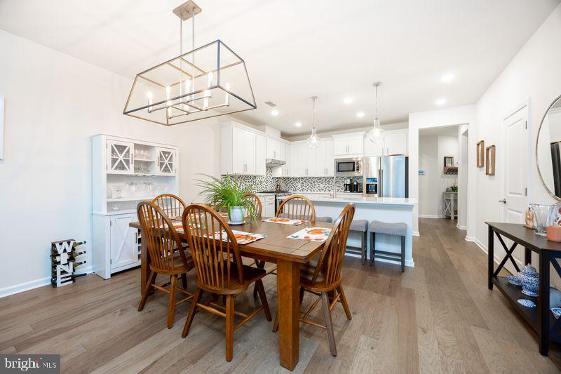 1008 Campbell Way Hatfield, PA 19440 - Photo 12 of 33 a view of a dining room with furniture and wooden floor
