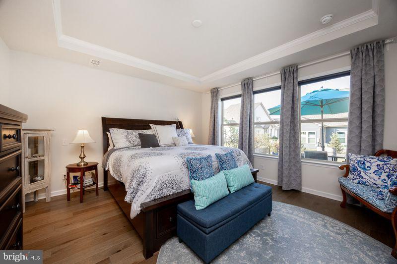 1008 Campbell Way Hatfield, PA 19440 - Photo 17 of 33 a spacious bedroom with a bed and a couch