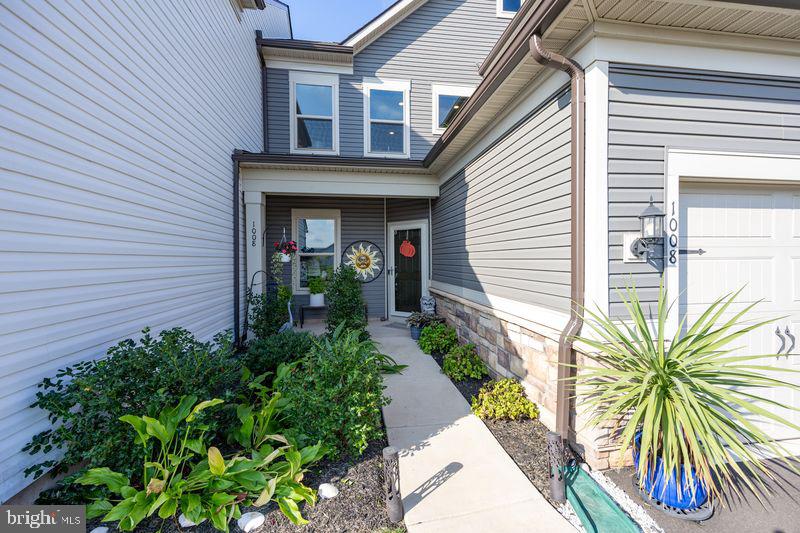 1008 Campbell Way Hatfield, PA 19440 - Photo 2 of 33 a view of a house with potted plants next to a road