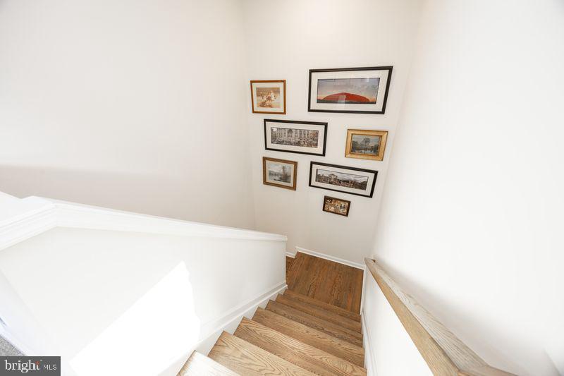 1008 Campbell Way Hatfield, PA 19440 - Photo 22 of 33 a view of a hallway with paintings on the wall