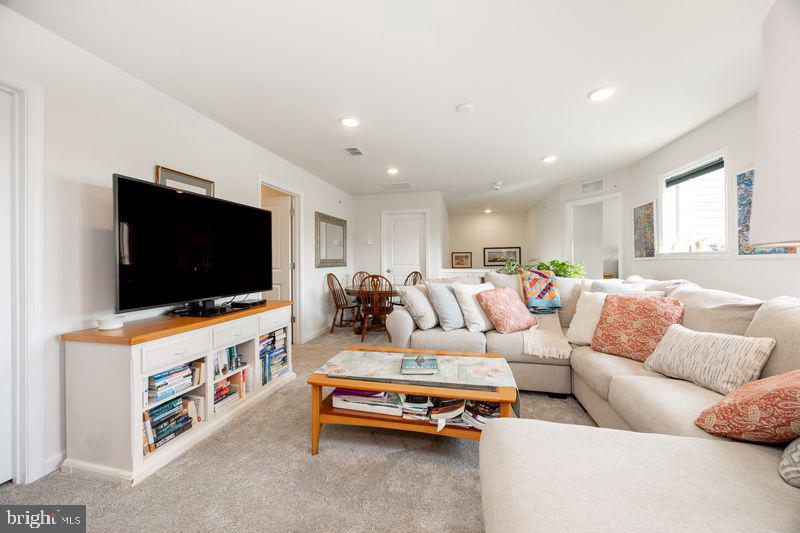 1008 Campbell Way Hatfield, PA 19440 - Photo 23 of 33 a living room with furniture and a flat screen tv