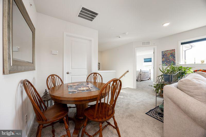 1008 Campbell Way Hatfield, PA 19440 - Photo 25 of 33 a view of a a dining room with furniture window and wooden floor