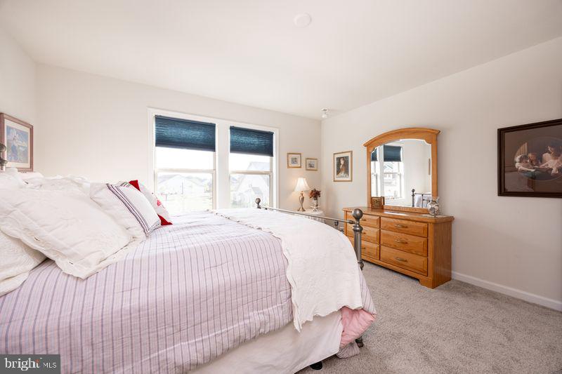 1008 Campbell Way Hatfield, PA 19440 - Photo 28 of 33 a bedroom with a bed and a dresser