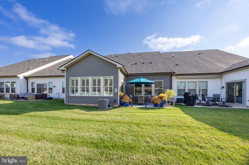 1008 Campbell Way Hatfield, PA 19440 - Photo 32 of 33 a view of a house with a yard and sitting area