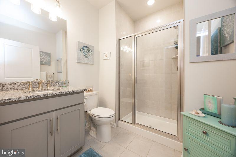1008 Campbell Way Hatfield, PA 19440 - Photo 7 of 33 a bathroom with a granite countertop sink toilet and shower