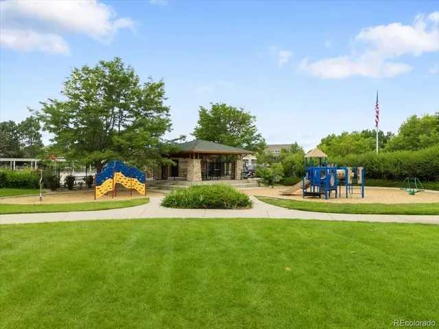 a view of a park with large trees