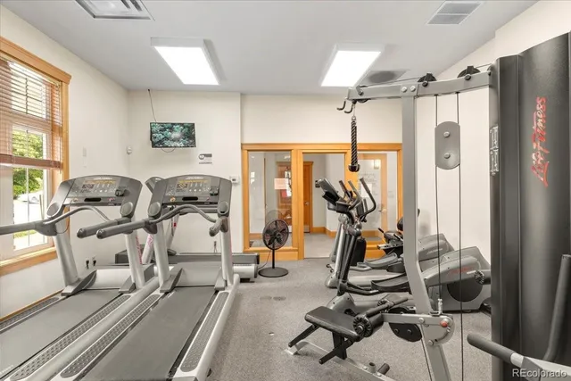 a view of a room with gym equipment
