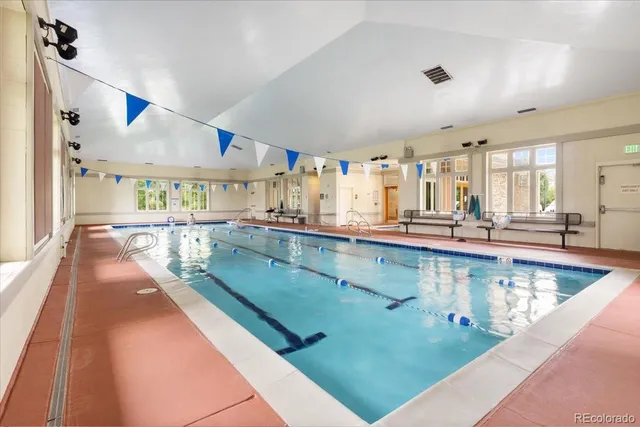 a view of a living room and kitchen