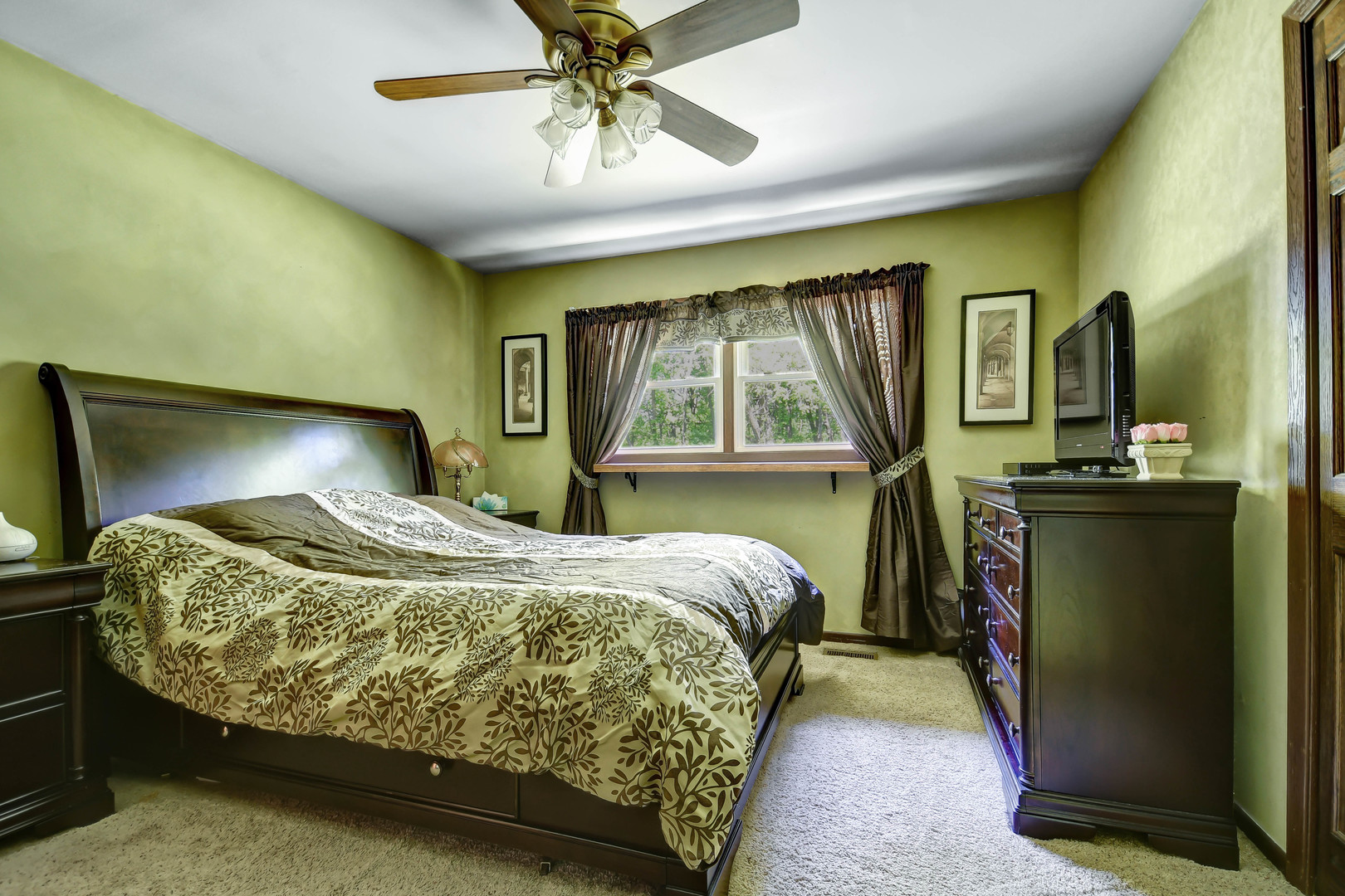 17342 Bluff Road Lemont, IL 60439 - Photo 13 of 32 a bedroom with a bed lamp and a large window