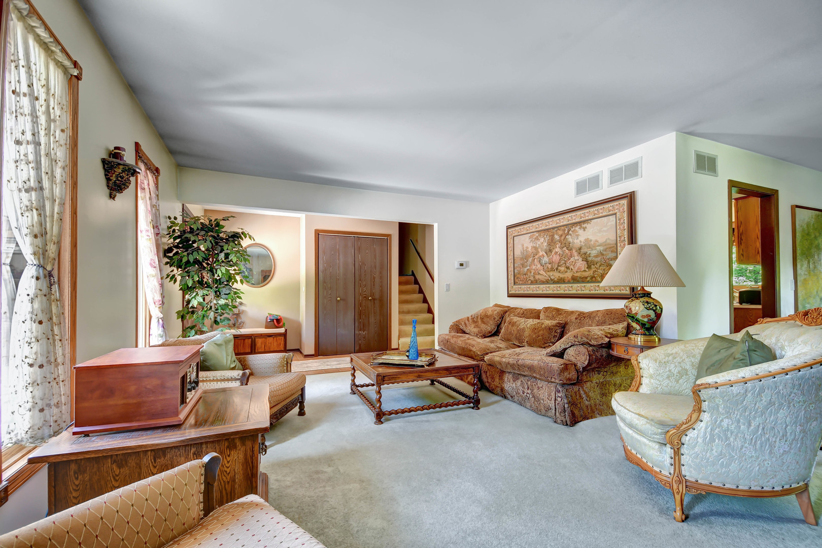 17342 Bluff Road Lemont, IL 60439 - Photo 4 of 32 a living room with furniture and a large window