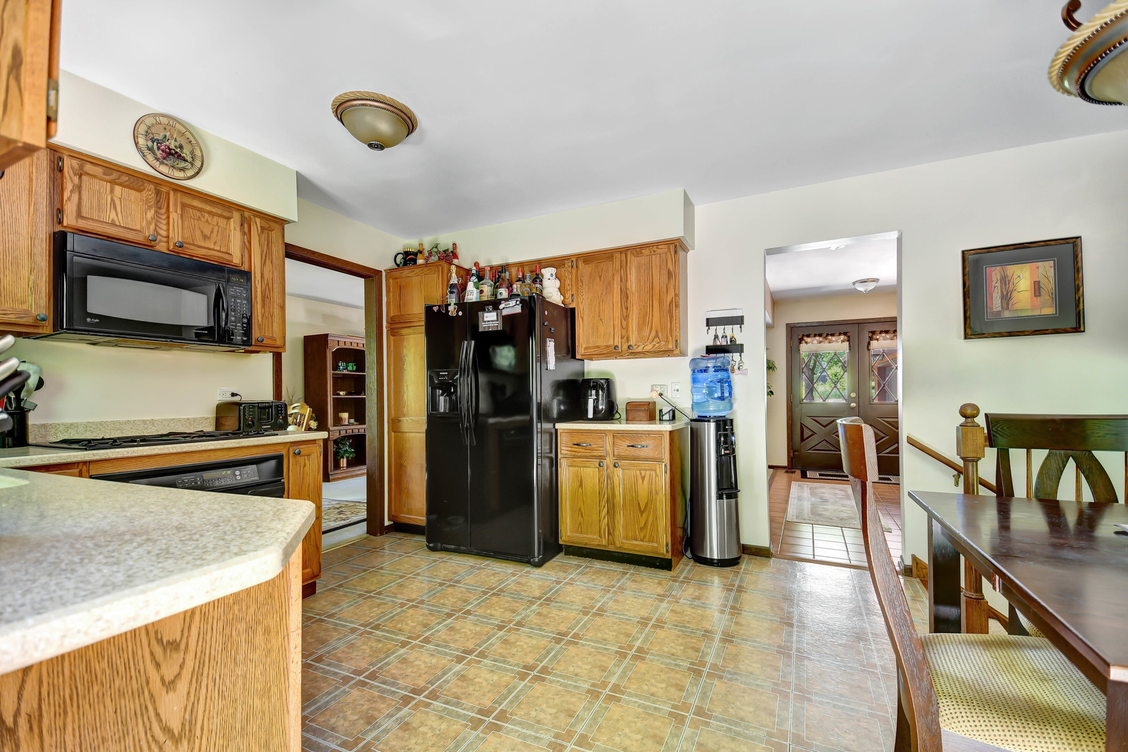 17342 Bluff Road Lemont, IL 60439 - Photo 9 of 32 a view of a kitchen with furniture and a kitchen