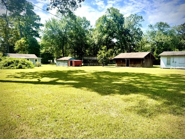 a view of a house with a garden