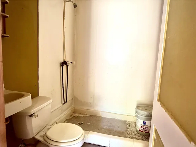 a view of empty room with windows