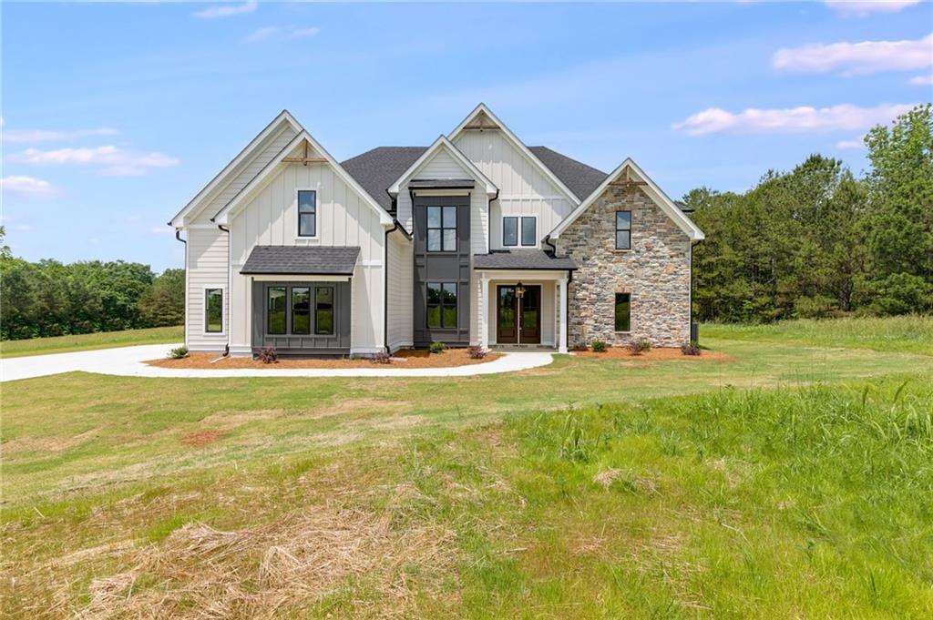 800 Lake Cir Road Buchanan, GA 30113 - Photo 1 of 1 a view of house that has a large pool with a yard and plants
