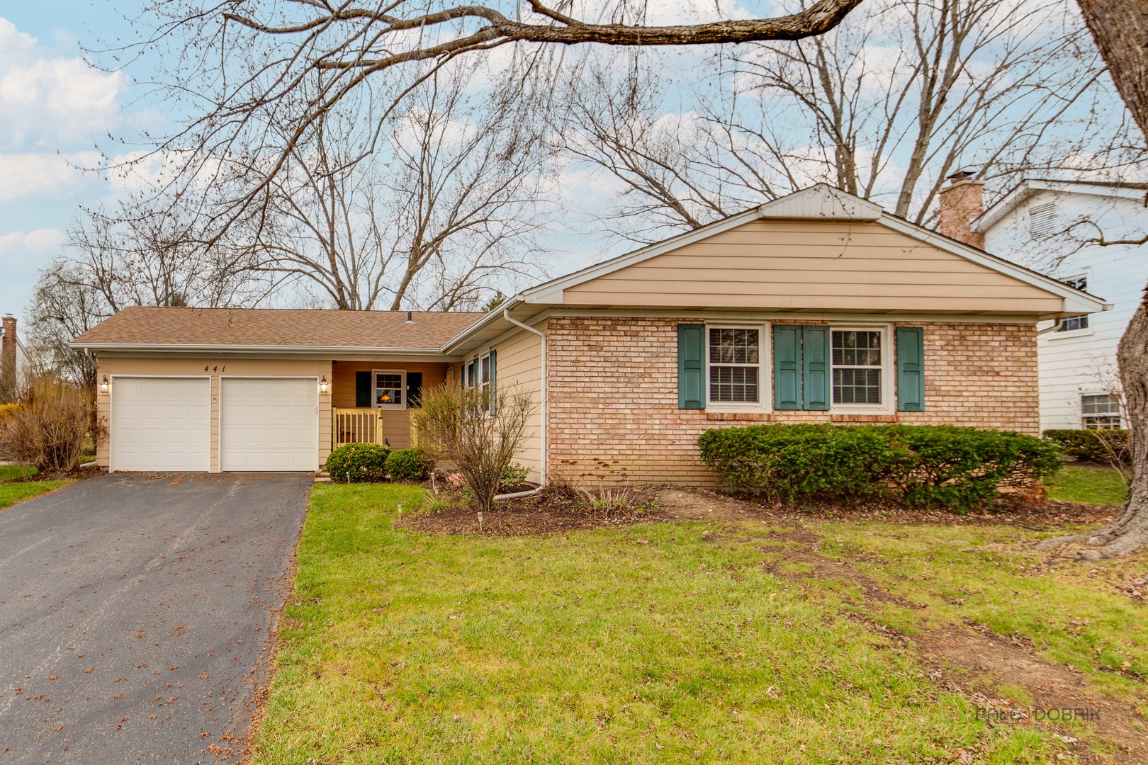 441 Arbor Gate Lane Buffalo Grove, IL 60089 - Photo 1 of 29 a front view of a house with garden
