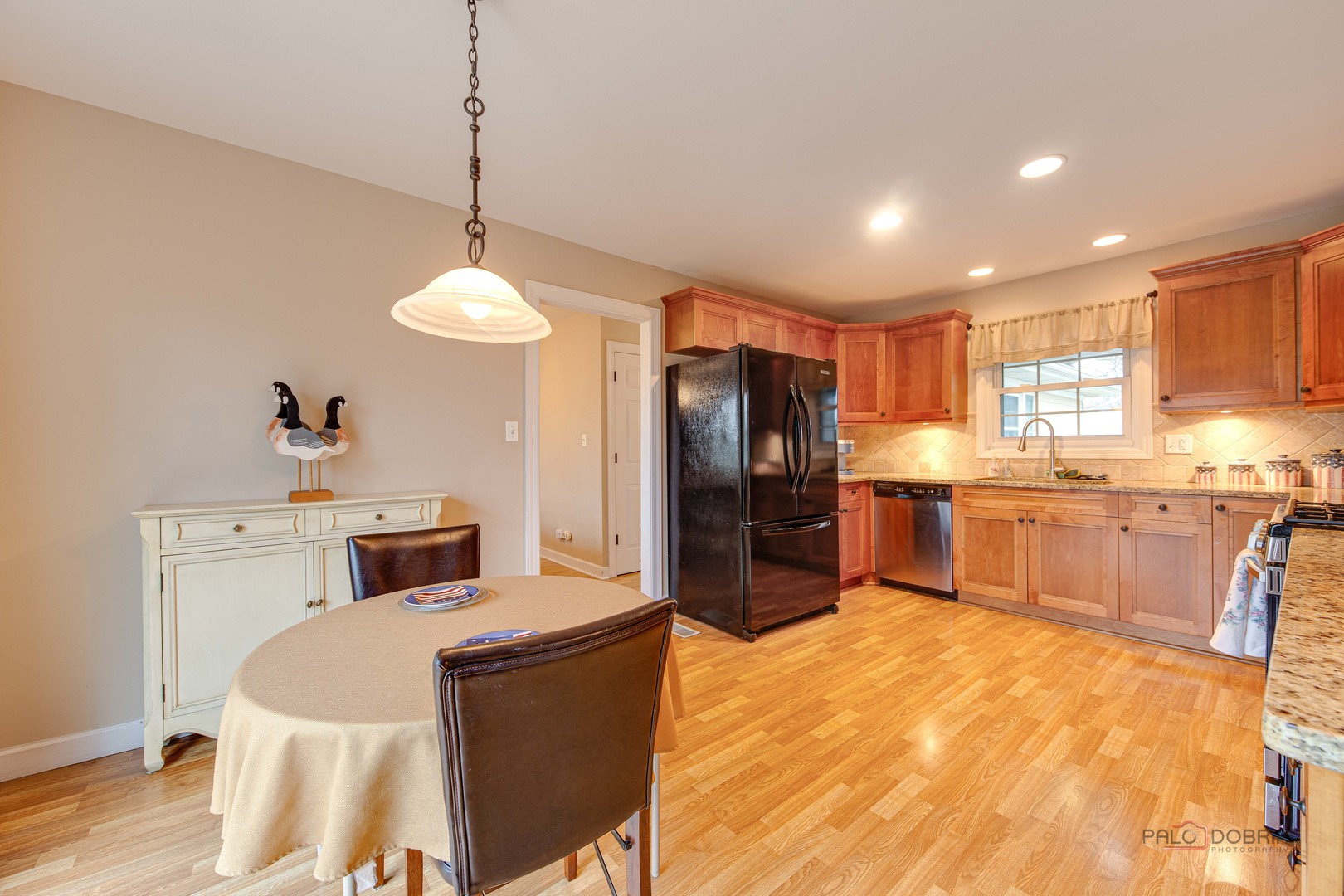441 Arbor Gate Lane Buffalo Grove, IL 60089 - Photo 16 of 29 a kitchen with refrigerator cabinets and a sink