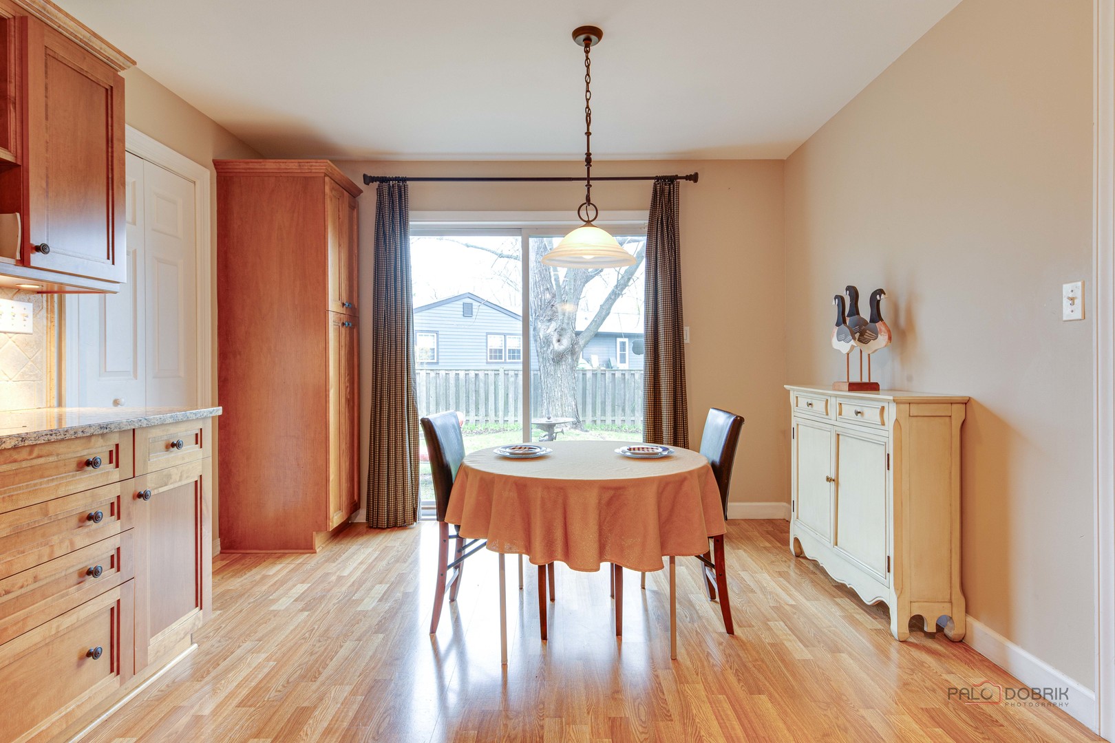 441 Arbor Gate Lane Buffalo Grove, IL 60089 - Photo 17 of 29 a dining room with furniture window wooden floor