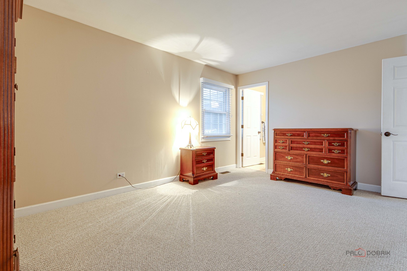 441 Arbor Gate Lane Buffalo Grove, IL 60089 - Photo 19 of 29 a room with a bed and a couch