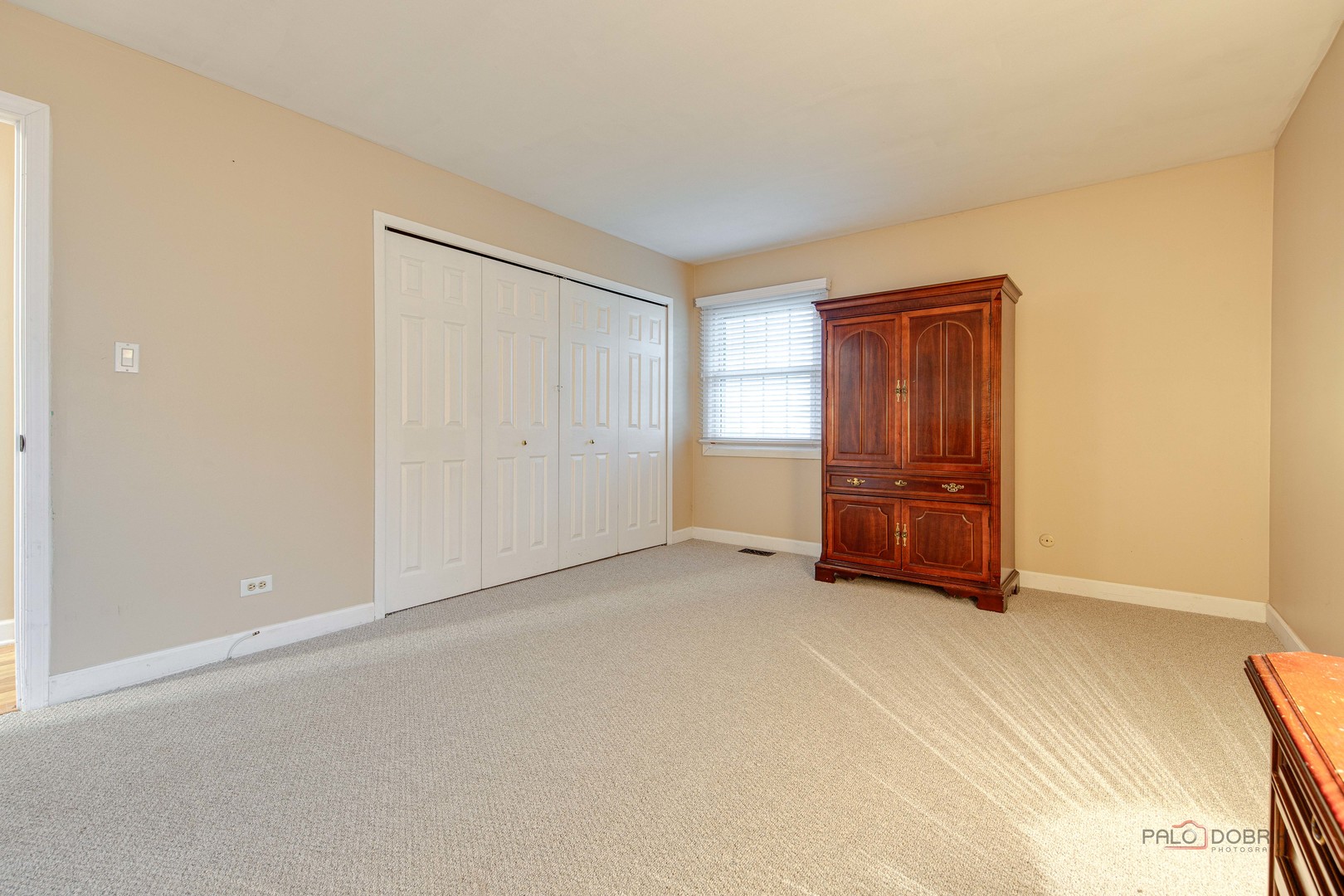 441 Arbor Gate Lane Buffalo Grove, IL 60089 - Photo 20 of 29 a view of an empty room with closet and cabinet