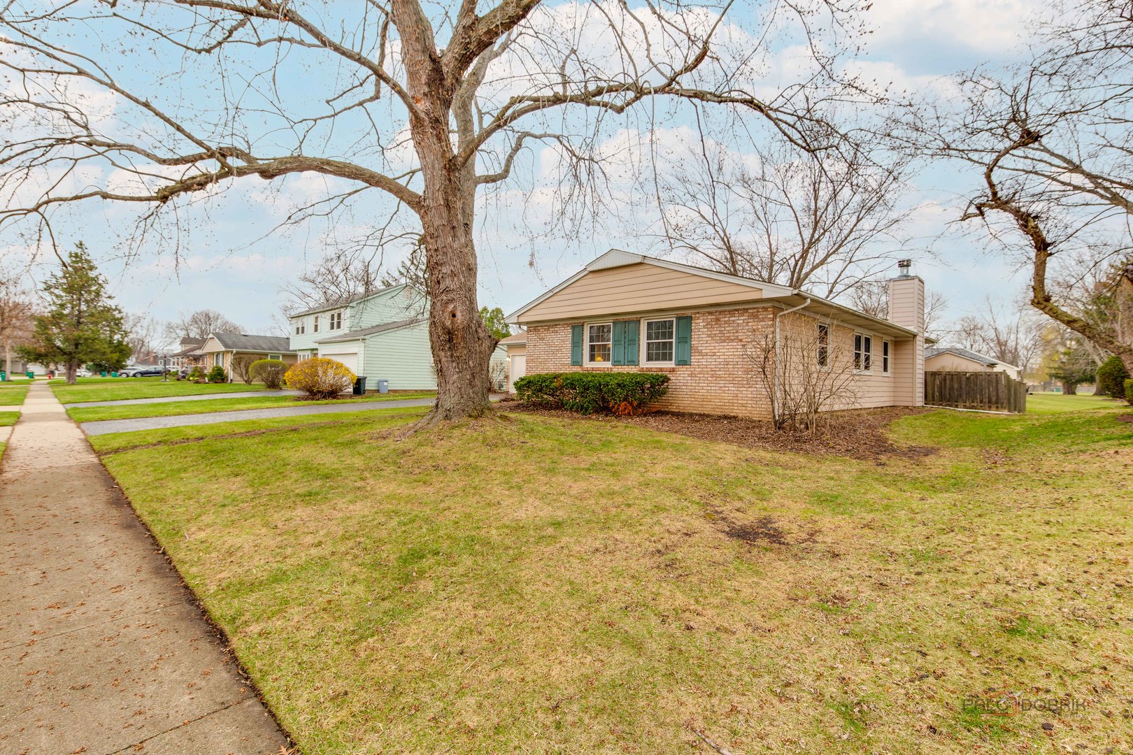 441 Arbor Gate Lane Buffalo Grove, IL 60089 - Photo 2 of 29 a house with garden in front of it