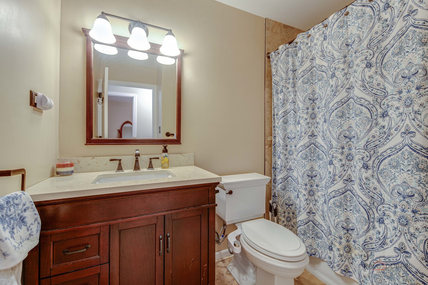441 Arbor Gate Lane Buffalo Grove, IL 60089 - Photo 22 of 29 a bathroom with a toilet sink and mirror